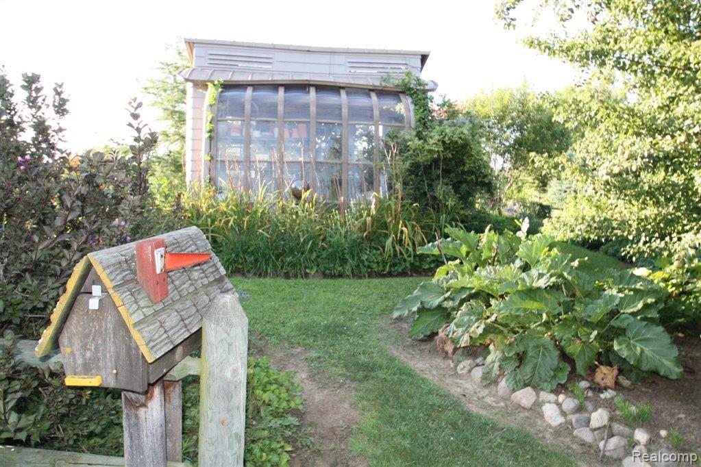 8280 Logana Road Avoca, MI 48006 - Photo 23 of 37 8280 Logana flower garden 2.JPG