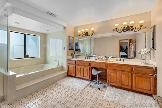 a bathroom with a toilet a sink and bathtub