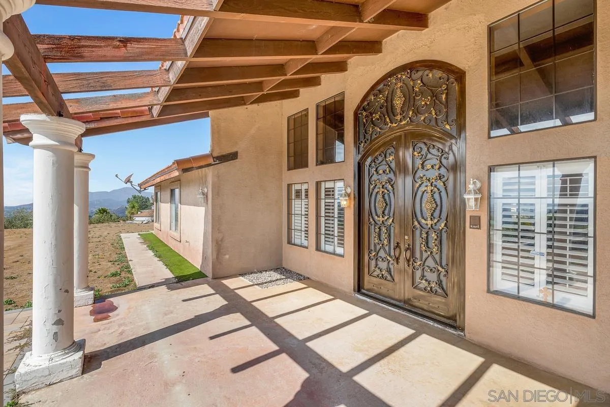 14650 Alkosh Road Jamul, CA 91935 - Photo 34 of 35 a view of a entryway door of the house