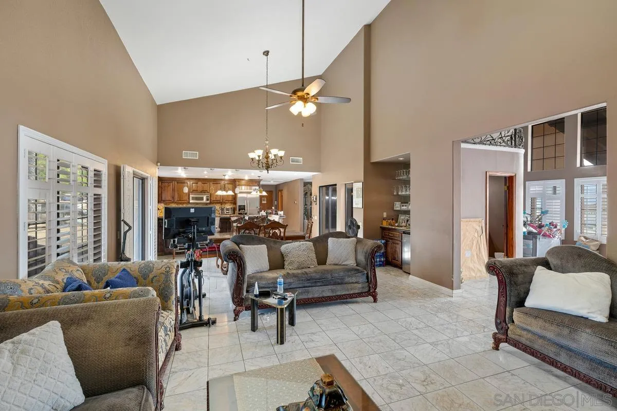 14650 Alkosh Road Jamul, CA 91935 - Photo 10 of 35 a living room with furniture and a large window