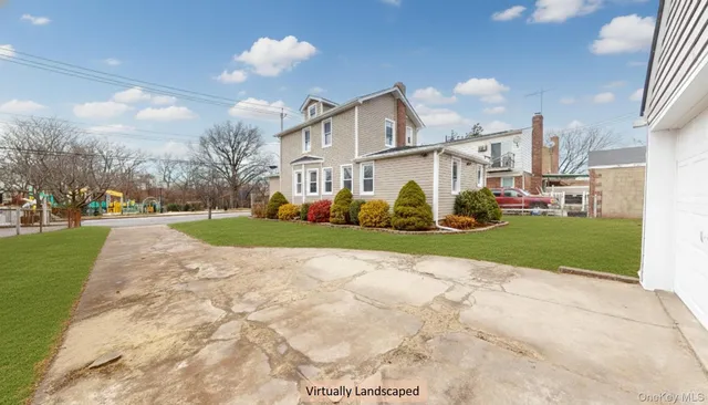 $898,000 | 136-11 Brookville Boulevard | Rosedale Terrace Ward