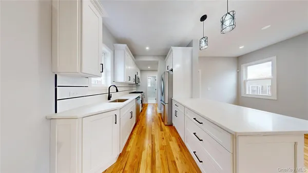 $898,000 | 136-11 Brookville Boulevard | Rosedale Terrace Ward