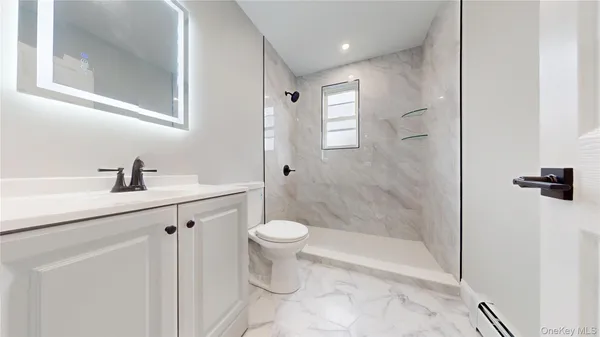 $898,000 | 136-11 Brookville Boulevard | Rosedale Terrace Ward