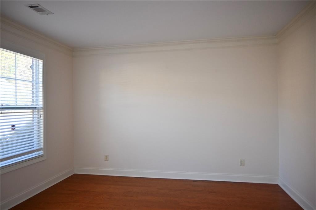 25 Kaktovic Court Southeast Grayson, GA 30017 - Photo 15 of 56 an empty room with a window