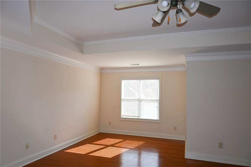 25 Kaktovic Court Southeast Grayson, GA 30017 - Photo 33 of 56 an empty room with a window