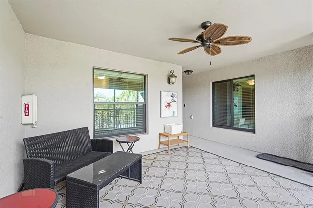an aerial view of a house with a lake view