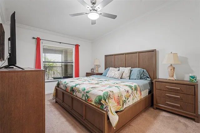 a front view of a house with a garden and plants