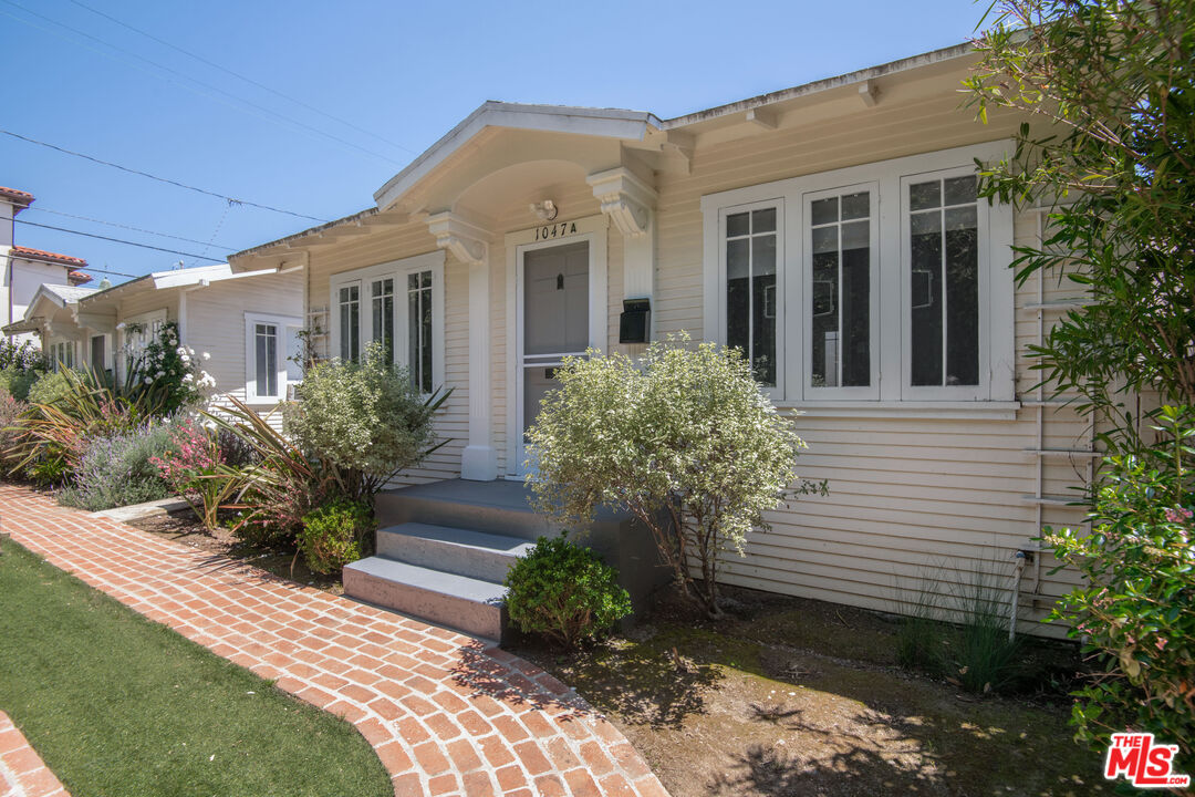 1047 9th Street Santa Monica, CA 90403 - Photo 13 of 20 a front view of a house with garden