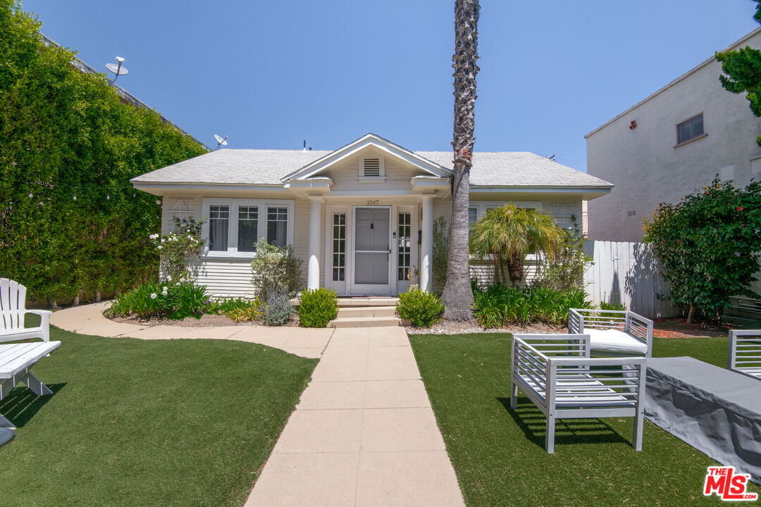 1047 9th Street Santa Monica, CA 90403 - Photo 14 of 20 a front view of a house with a garden and patio