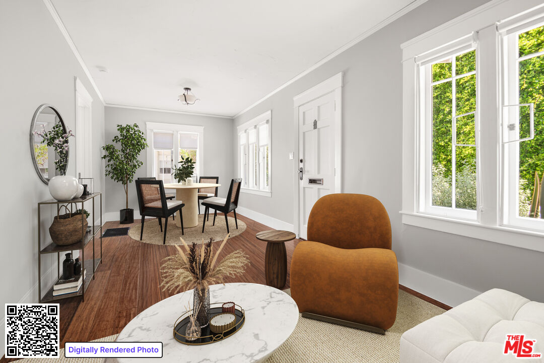 1047 9th Street Santa Monica, CA 90403 - Photo 4 of 20 a living room with furniture and a large window