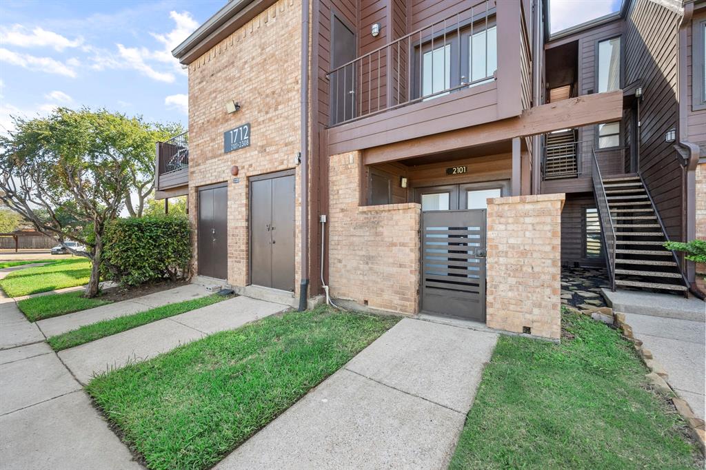 1712 Baird Farm Circle, Unit 2101 Arlington, TX 76006 - Photo 28 of 30 a front view of a house with a garden