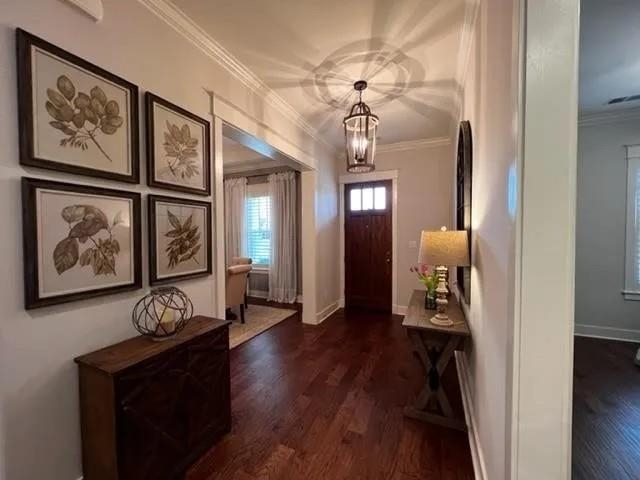 498 South Shea Road Collierville, TN 38017 - Photo 9 of 17 Entryway with dark wood-type flooring, baseboards, and crown molding