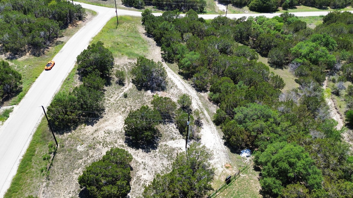Lot 32 Garner Ranch Road Bertram, TX 78605 - Photo 3 of 8 a view of a garden with a tree