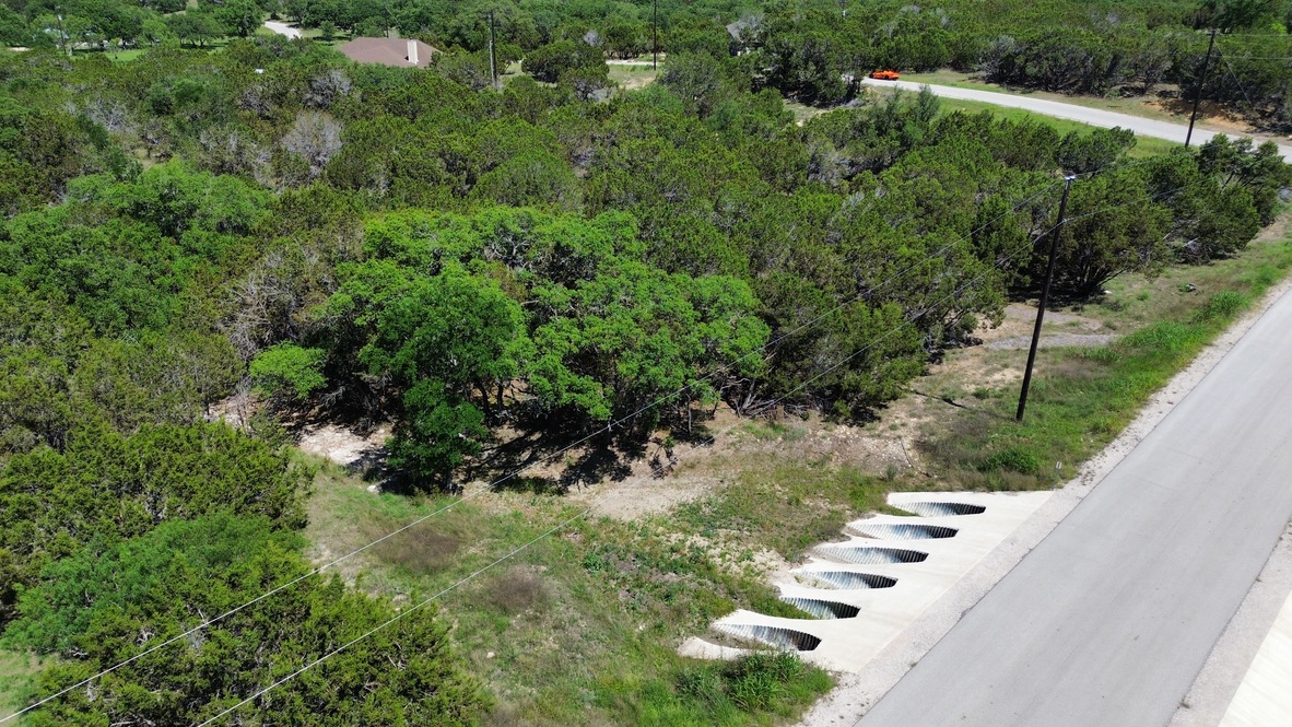 Lot 32 Garner Ranch Road Bertram, TX 78605 - Photo 4 of 8 a view of a garden with a tree