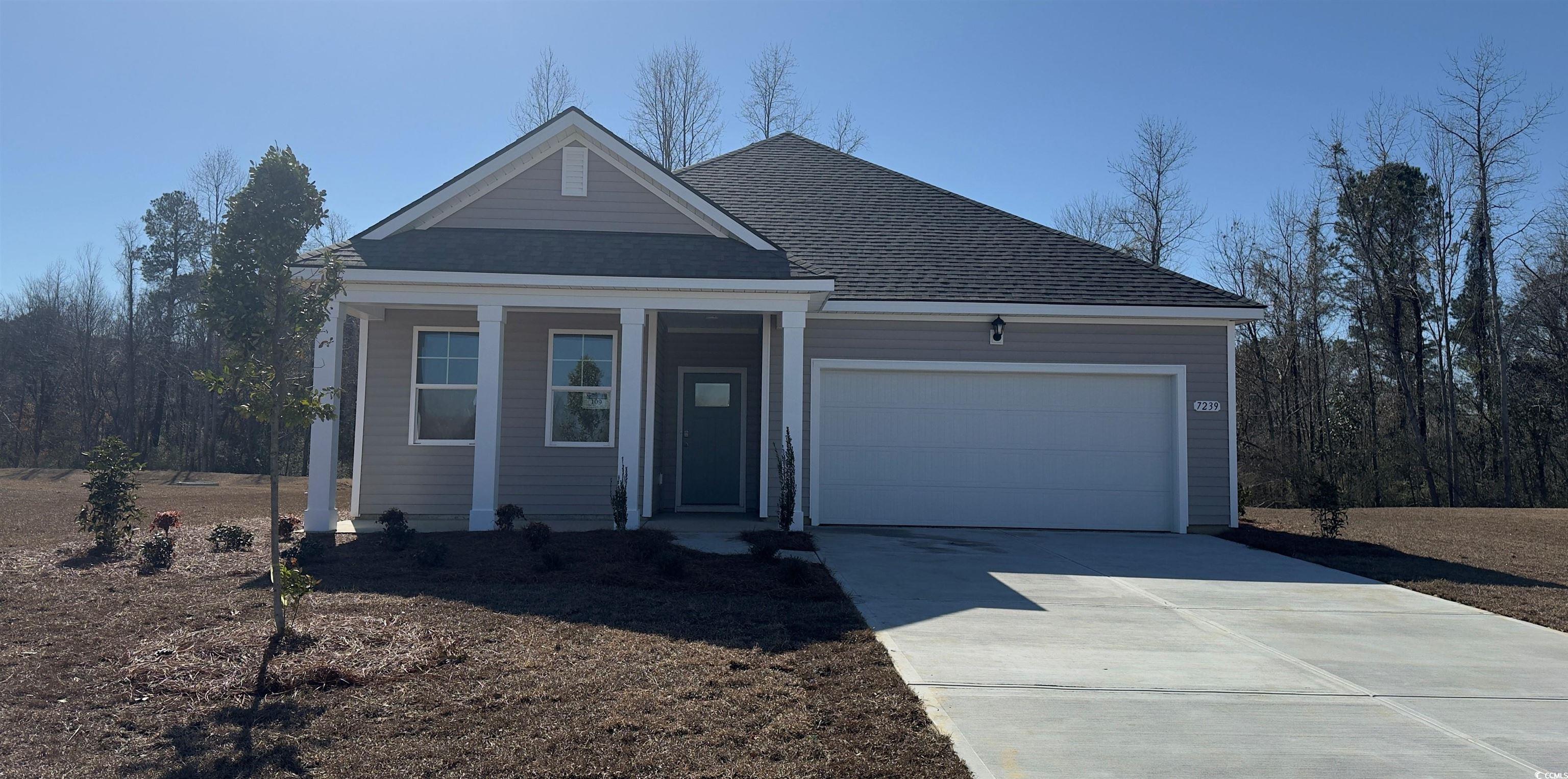 7239 Meadow Walk Loop Loris, SC 29569 - Photo 1 of 13 View of front facade featuring roof with shingles,