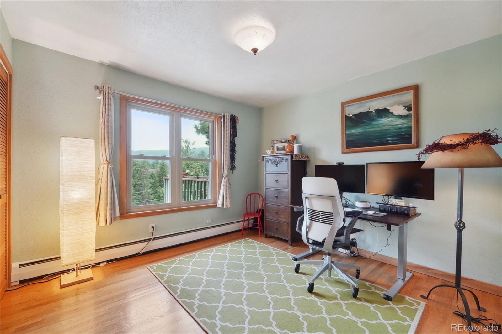 855 Kelly Road West Boulder, CO 80302 - Photo 26 of 40 a workspace with furniture and a window