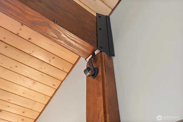 a picture of a bathroom with a shower and mirror