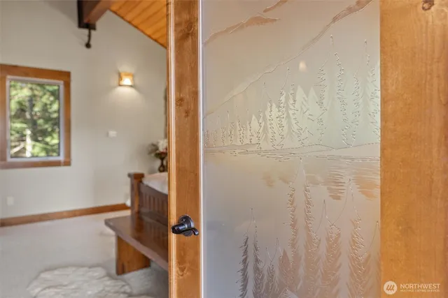 a bedroom with furniture and a fireplace