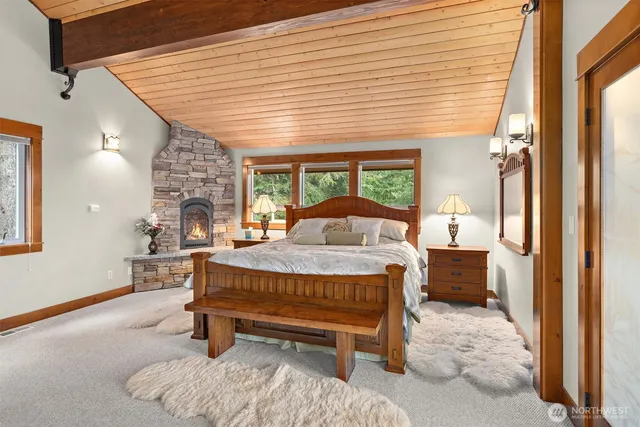 a bed room with a bed and a window