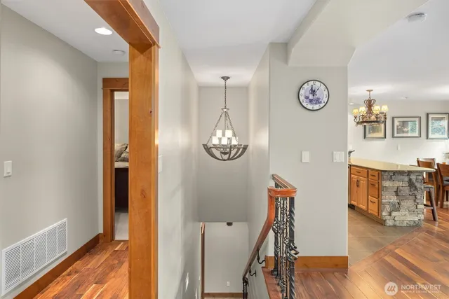 a view of entryway with wooden floor