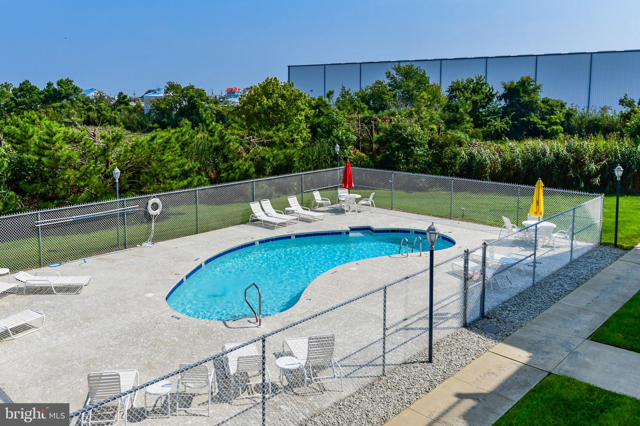 9742 Golf Course Road, Unit 202 Ocean City, MD 21842 - Photo 18 of 36 Time To Go To The Pool and Get Some Sun!