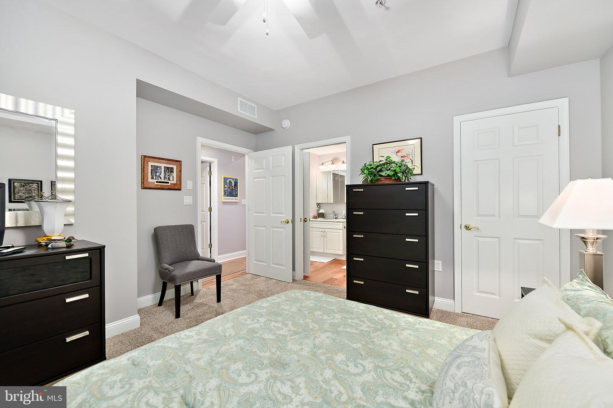 9742 Golf Course Road, Unit 202 Ocean City, MD 21842 - Photo 30 of 36 The room has a paddle fan and tray ceiling