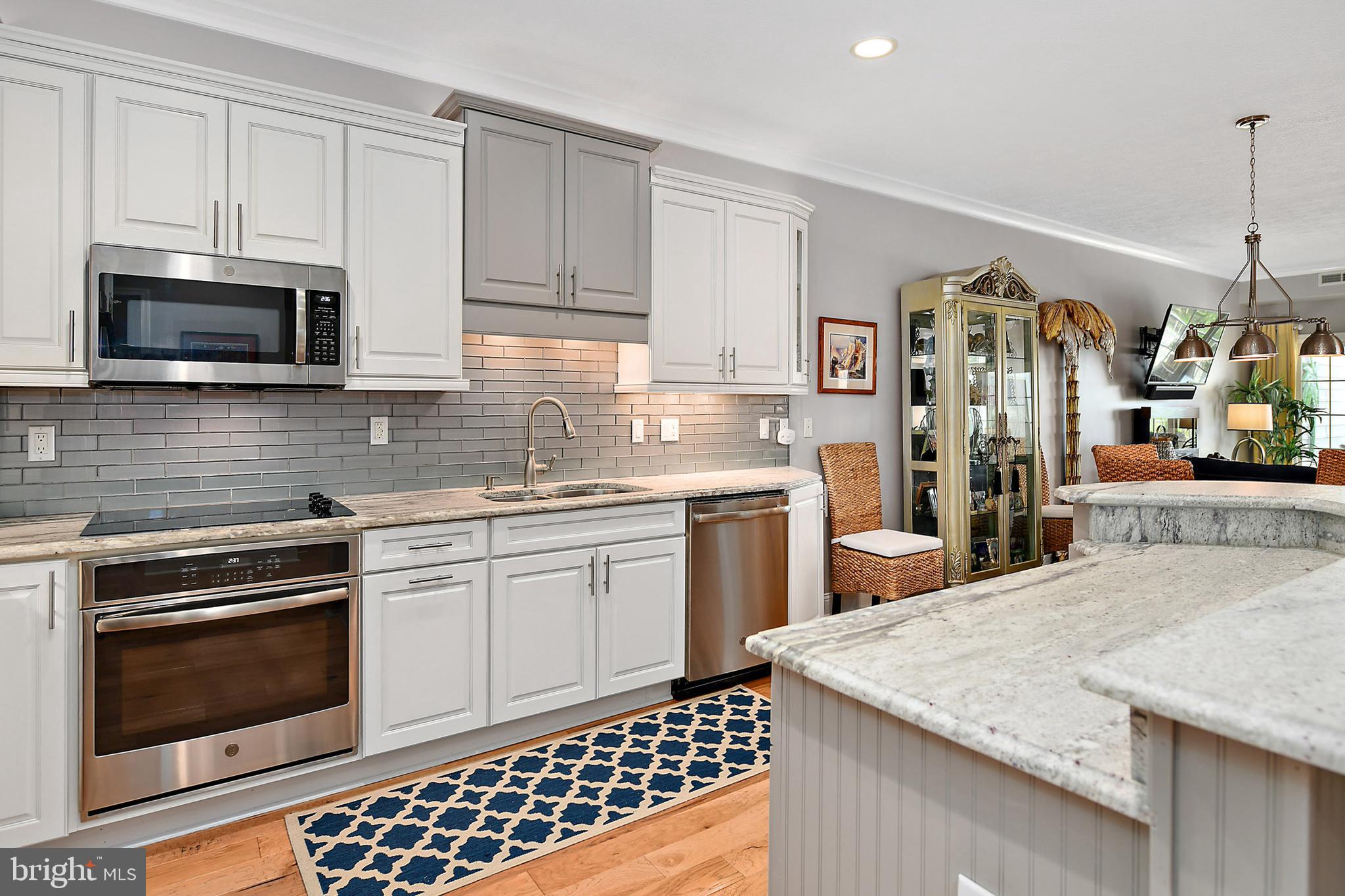 9742 Golf Course Road, Unit 202 Ocean City, MD 21842 - Photo 4 of 36 Under Cabinet & Over Cabinet Lights