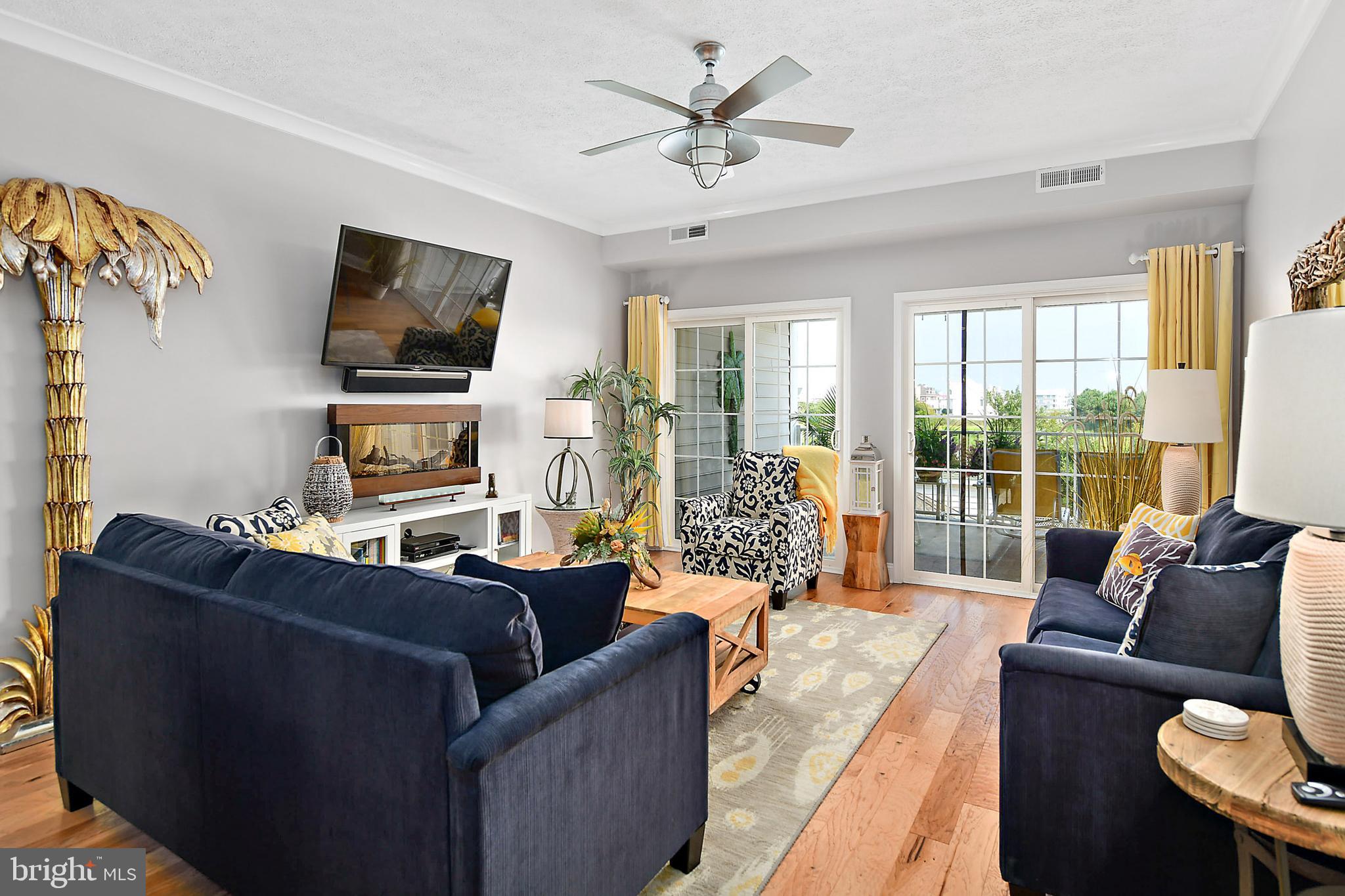 9742 Golf Course Road, Unit 202 Ocean City, MD 21842 - Photo 10 of 36 Wall Mounted Flat Screen & Electric F/P