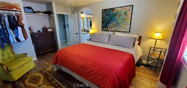 a spacious bathroom with a granite countertop sink mirror and
