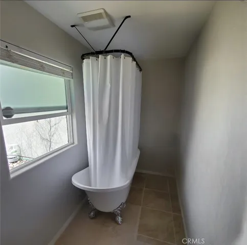 a bathroom with a bathtub