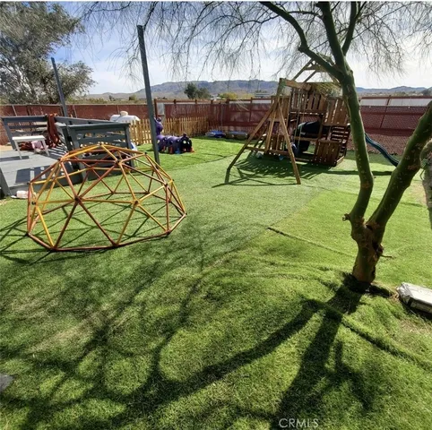 a view of balcony with wooden floor