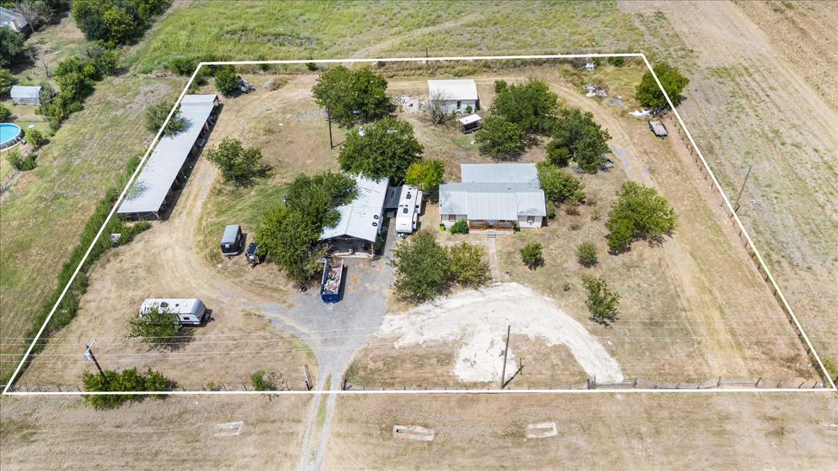 19016 Farm To Market Road 973 Coupland, TX 78615 - Photo 4 of 18 an aerial view of a house with a yard