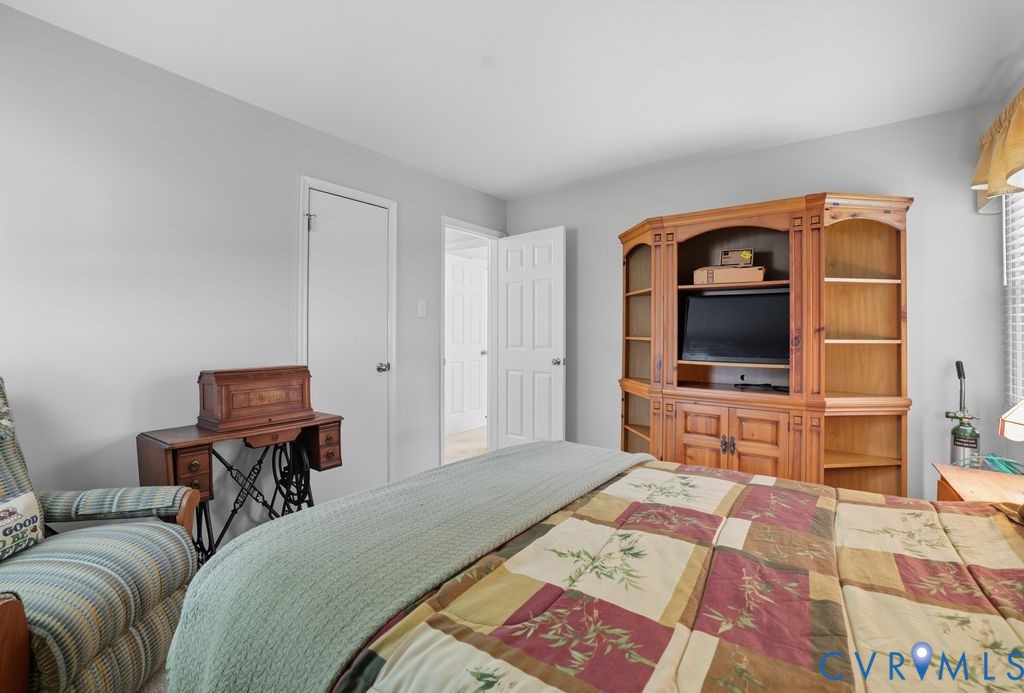 3403 Fallbrooke Court North Chesterfield, VA 23235 - Photo 17 of 23 a living room with furniture and a flat screen tv
