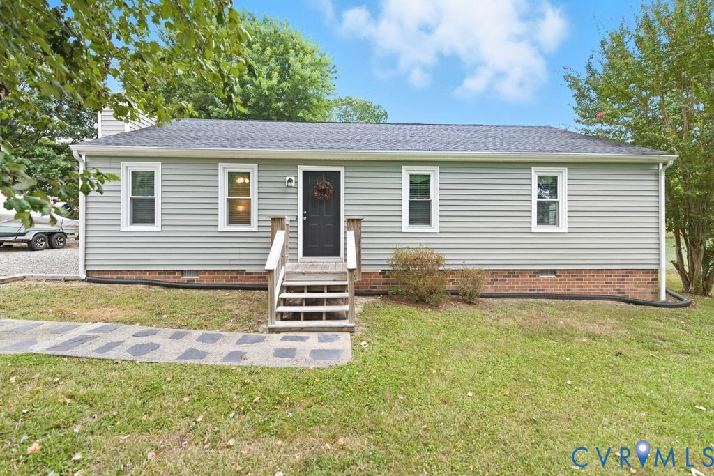 3403 Fallbrooke Court North Chesterfield, VA 23235 - Photo 2 of 23 a view of a house with a yard and deck