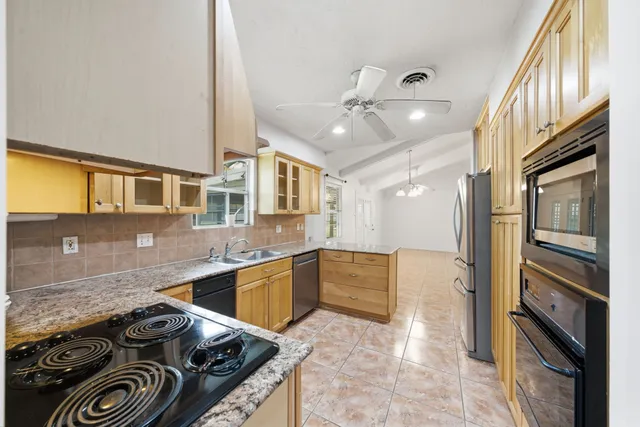 a view of a room with a table and chair