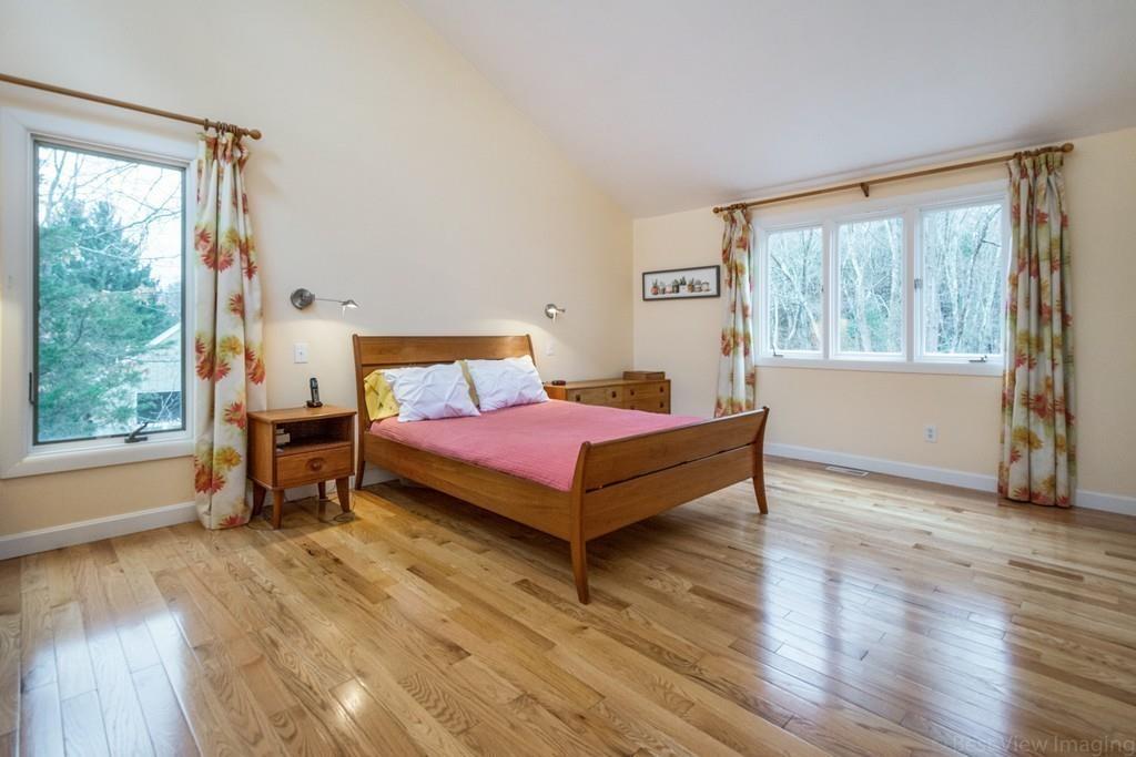 51 Cobleigh Road Boxborough, MA 01719 - Photo 16 of 32 a bedroom with a bed and a window