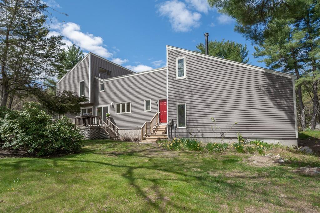 51 Cobleigh Road Boxborough, MA 01719 - Photo 2 of 32 a view of backyard with small cabin