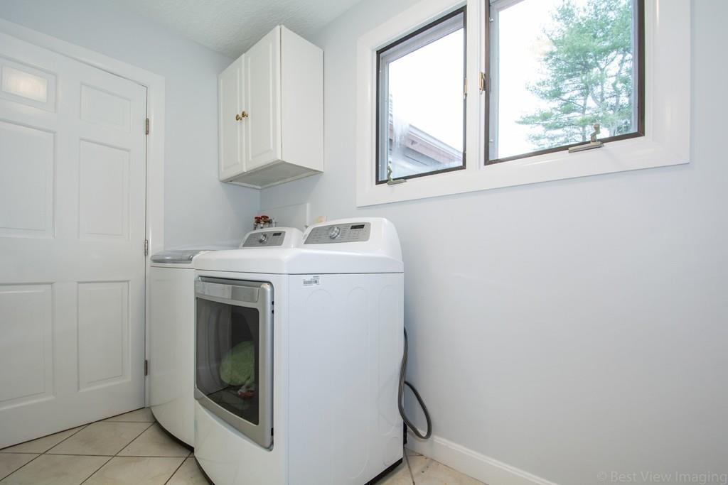 51 Cobleigh Road Boxborough, MA 01719 - Photo 26 of 32 a utility room with dryer and washer