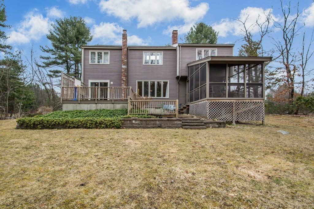 51 Cobleigh Road Boxborough, MA 01719 - Photo 28 of 32 a front view of a house with garden