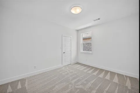 a bathroom with a granite countertop sink a toilet and a bathtub