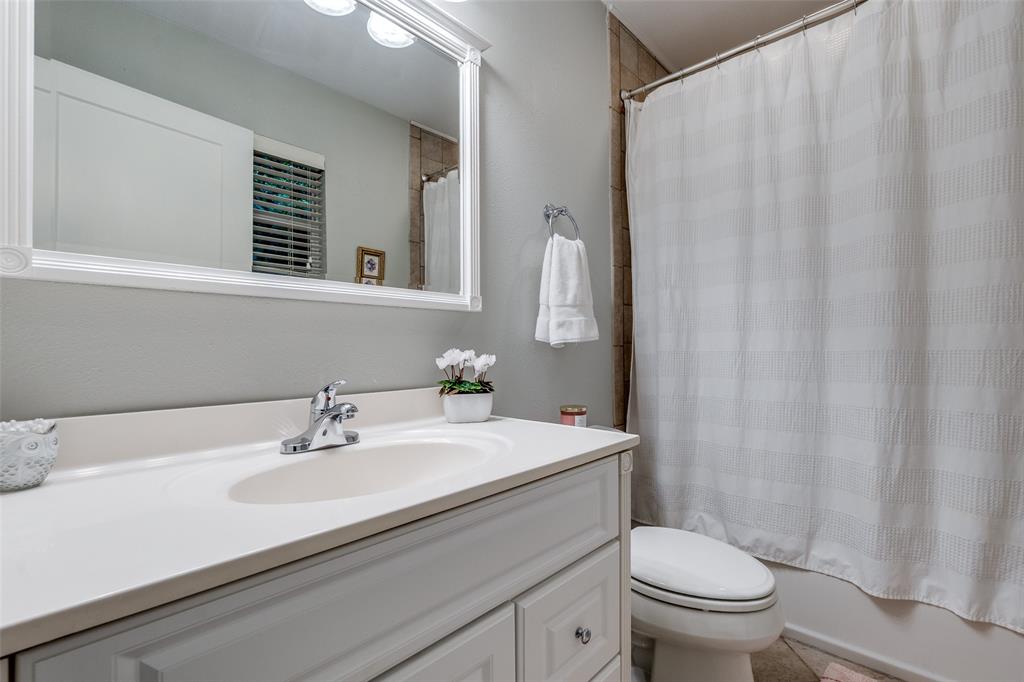 4159 Clover Lane Dallas, TX 75220 - Photo 19 of 25 Full bath with vanity, toilet, and shower / bath combination with curtain