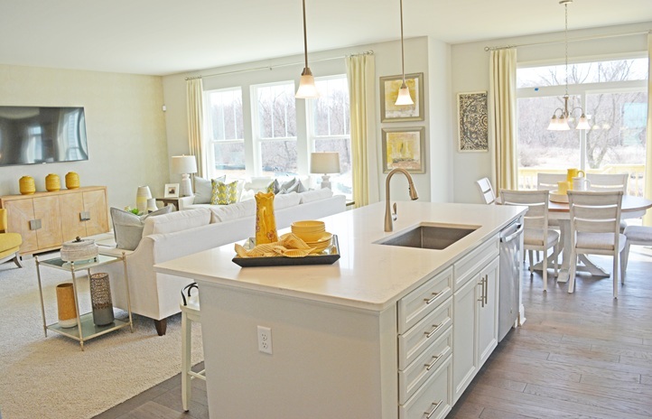 1174 Slade Road South Elgin, IL 60177 - Photo 7 of 18 a kitchen that has a lot of white cabinets and wooden floor