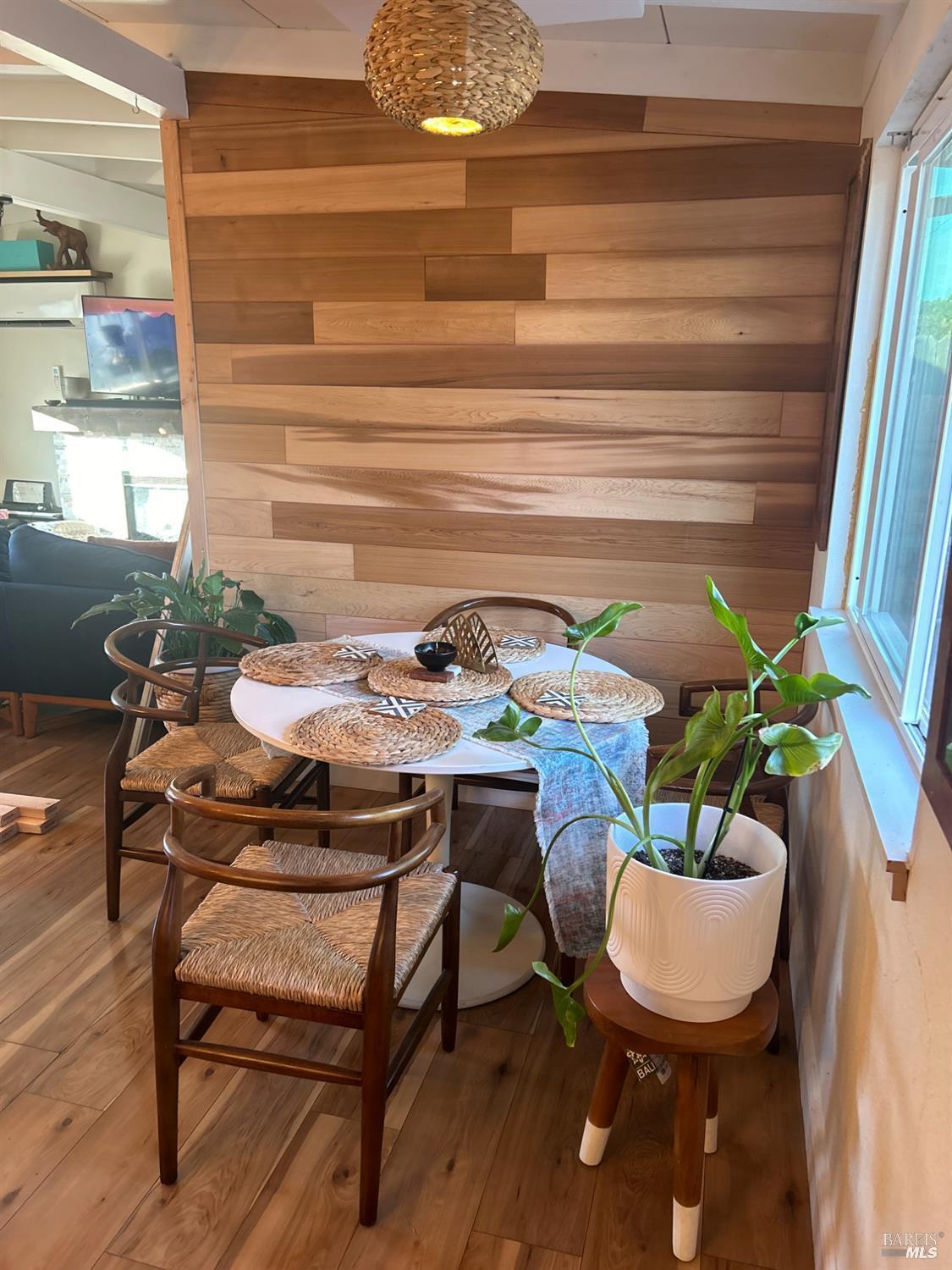 133-133 Rio Del Mar American Canyon, CA 94503 - Photo 3 of 3 a dining room with furniture and wooden floor