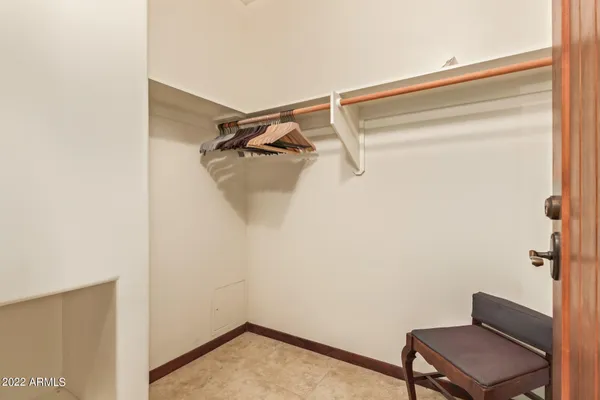 a view of a room with rack on the wall