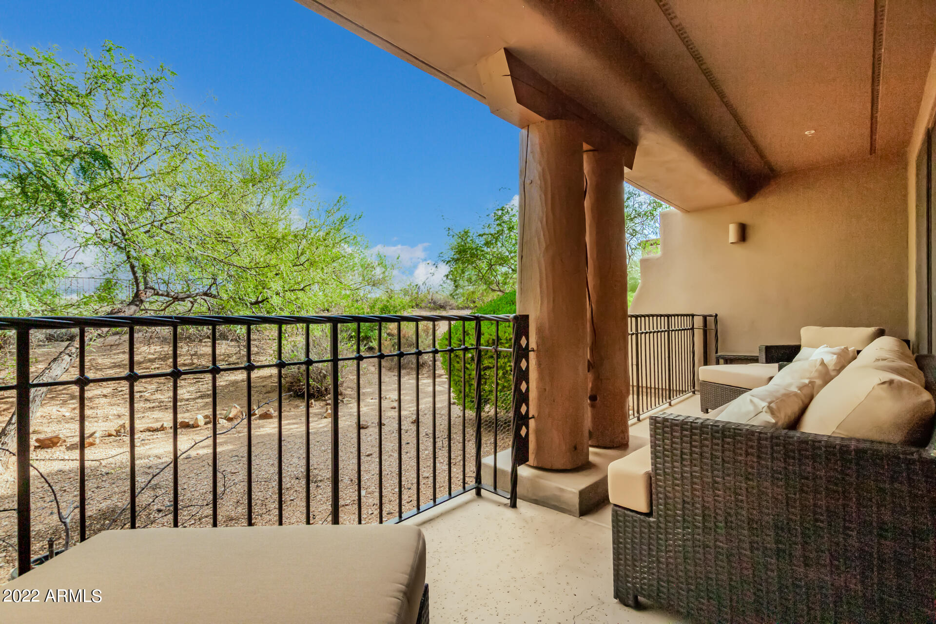 36601 North Mule Train Road, Unit A23 Carefree, AZ 85377 - Photo 18 of 26 a balcony with couch