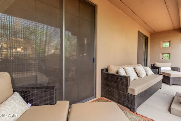 a living room with a couch and a table