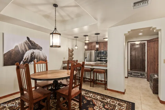 a view of a dining room with furniture