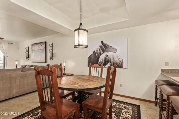 a view of a dining room with furniture