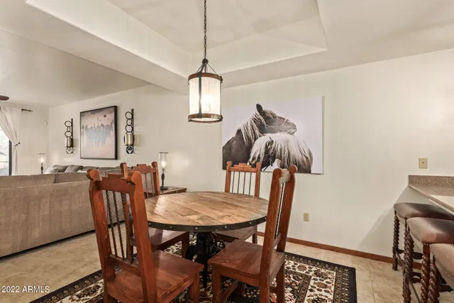 a view of a dining room with furniture