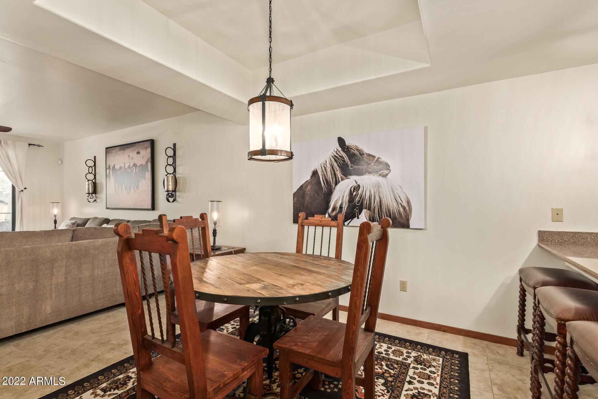 36601 North Mule Train Road, Unit A23 Carefree, AZ 85377 - Photo 4 of 26 a view of a dining room with furniture